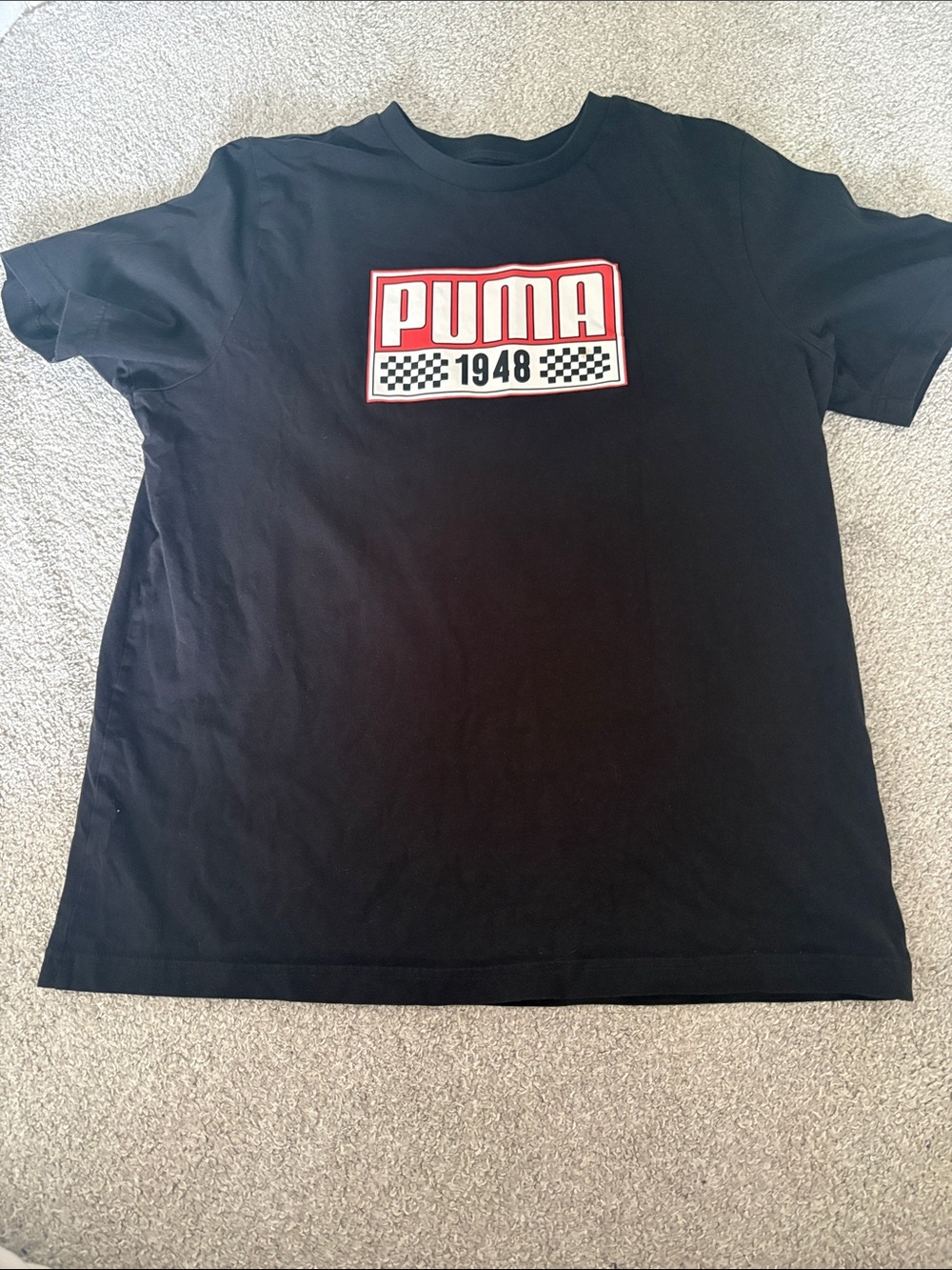 Puma Black Tee with Red & White Logo Patch